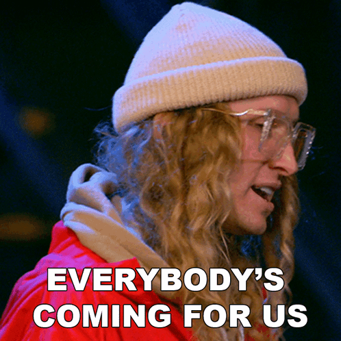 Person With Beanie And Glasses Saying Everybody's Coming For Us GIF