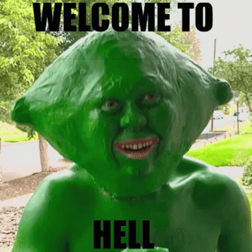 Person With Green Face Saying Welcome to Hell