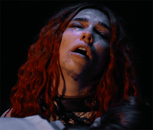 Person with Long Red Hair Close Up