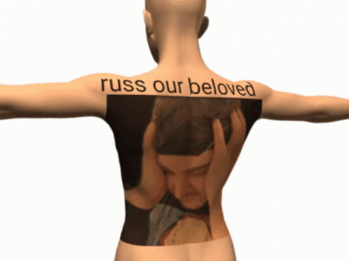 Person With Man On Back Saying Russ Our Beloved GIF
