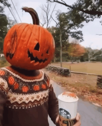 Person With Pumpkin Head Holding Starbucks Cup