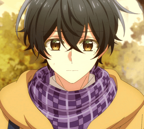 Person With Purple and Yellow Scarf
