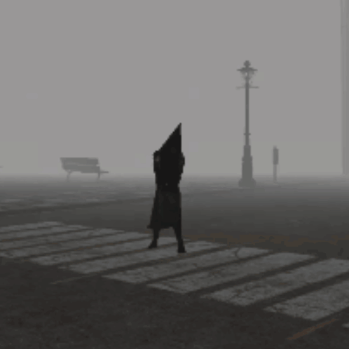 Person With Pyramid Head Crossing Street