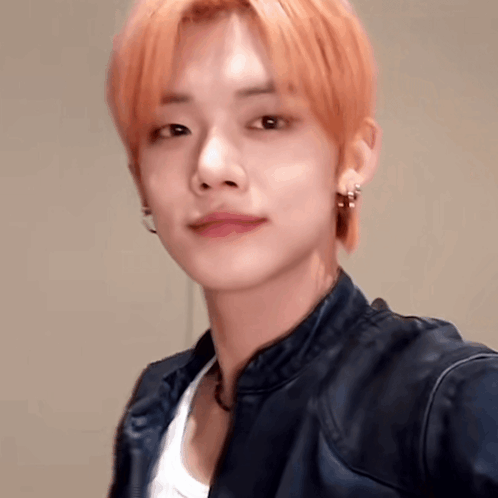 Person With Red Hair and Blue Jacket