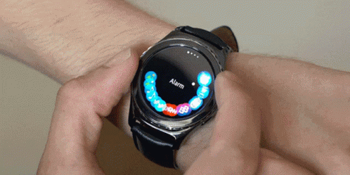 Person With Smart Watch Saying Alarm