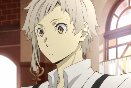 Person With White Hair And Yellow Eyes GIF