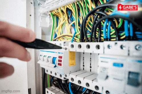 Person Working On Electrical Box With Gabe's Electrical Service Logo GIF