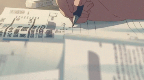 Person Writing 2014 on Paper