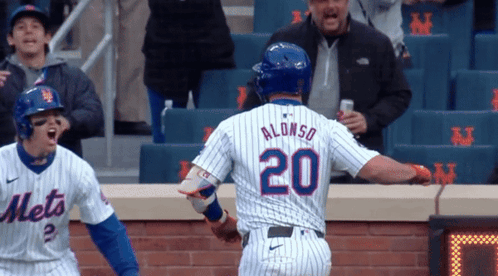 Pete Alonso Jumping High Five GIF