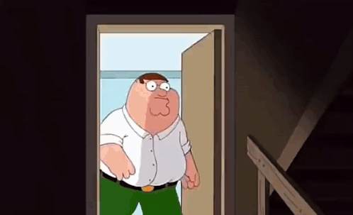Peter Griffin From Family Guy Is Standing In A Doorway Looking Out . GIF