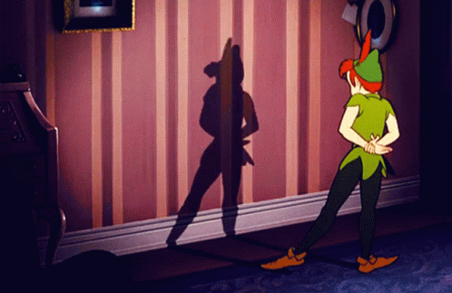 Peter Pan Standing in Front of Wall With Shadow