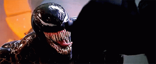 Petrifying Venom Showing Pointed Teeth GIF