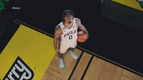 Philadelphia Basketball Player Holding Ball