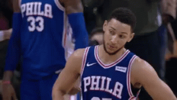Philadelphia Basketball Player in Blue Jersey