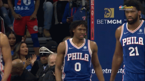Philadelphia Basketball Players in Front of BetMGM Sign
