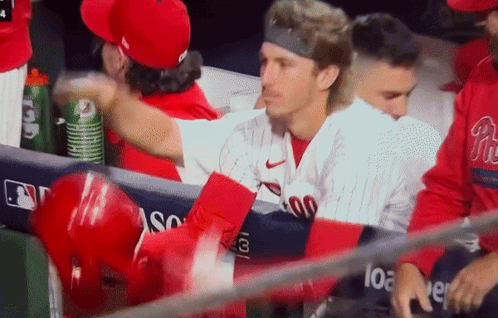 Phillies Jersey Man Talking To Another GIF