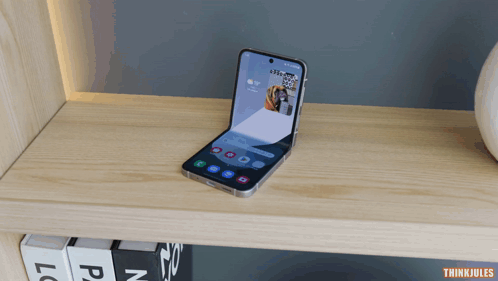 Phone on Wooden Shelf Saying Thinkjules