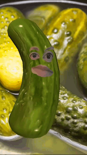 Pickle With Face in Front of Bowl of Pickles