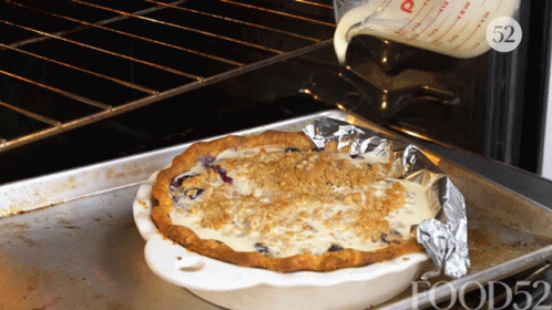 Pie Being Poured Into Oven GIF