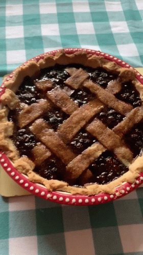 Pie With Lattice Crust On Checkered Tablecloth GIF