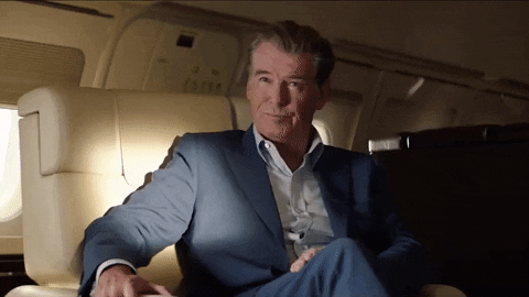 Pierce Brosnan Looks Of Intrigued GIF