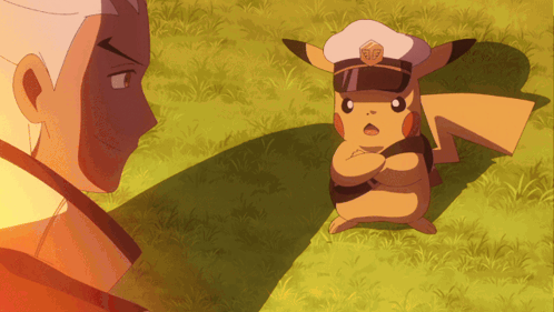 Pikachu in Police Hat Next to Man in Field