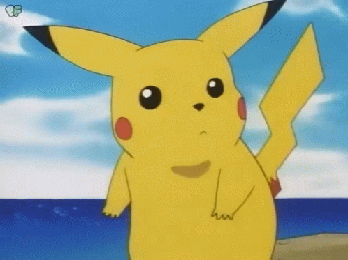 Pikachu Standing on Beach Looking at Ocean
