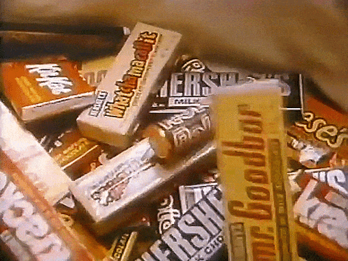Pile Of Candy With Mr. Goodbar And Hershey GIF