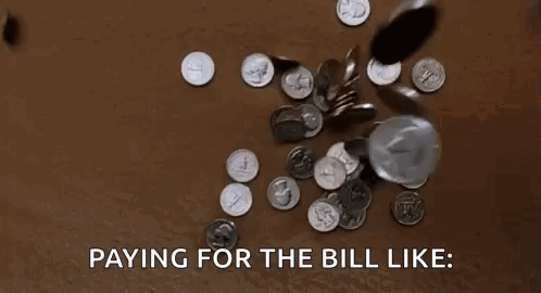 Pile of Coins Paying for the Bill
