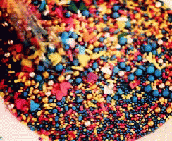 Pile of Red Yellow and Blue Sprinkles