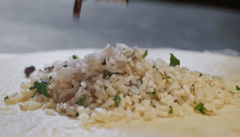 Pile of Rice Being Poured