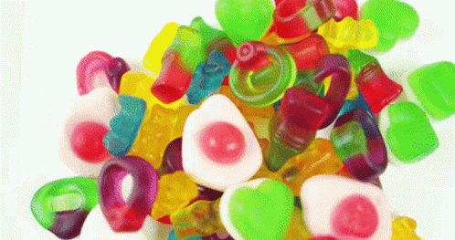 Pile Of Various Gummies GIF