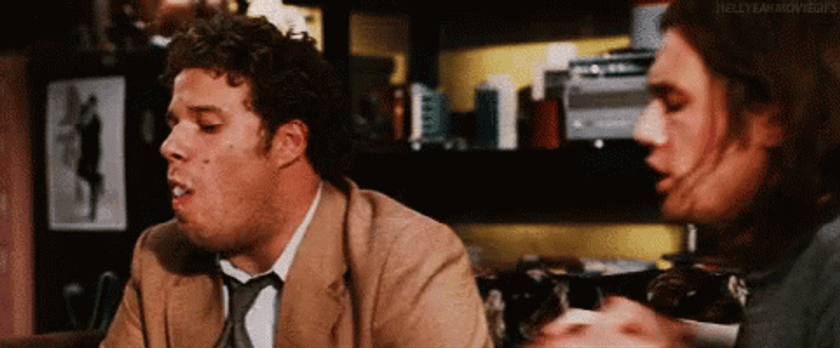 Pineapple Express Seth Rogen Puffing Smoke GIF