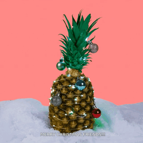 Pineapple With Christmas Decorations Saying Merry Christmas Friends