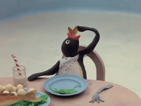Pingu Eating Fish GIF