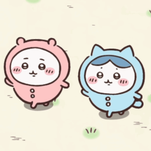 Pink And Blue Cartoon Characters In Grass GIF