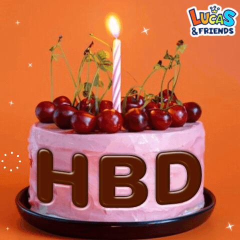 Pink Birthday Cake With Cherries and Lit Candle
