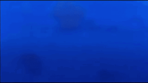 Pink Cartoon Character Swimming in Ocean with Blue Sky