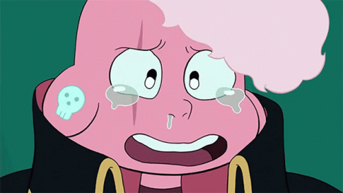 Pink Cartoon Character With Skull on Ear Crying
