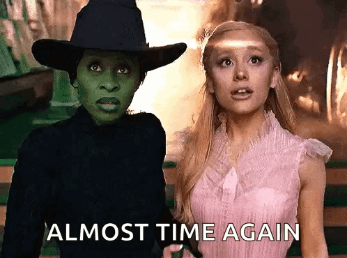 Pink Dress Woman And Black Hat Witch GIF