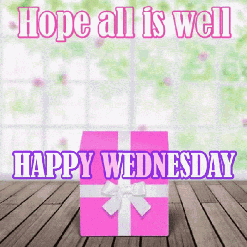 Pink Gift Box on Wooden Floor Saying Hope All Is Well Happy Wednesday