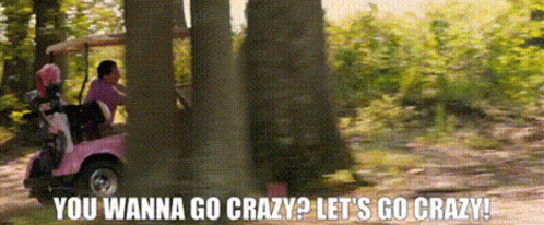 Pink Golf Cart Driving Through Woods Saying You Wanna Go Crazy Let's Go Crazy