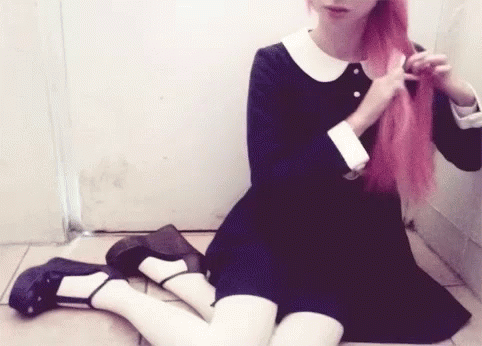 Pink-Haired Girl in Black Dress and White Tights