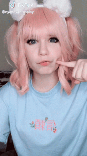 Pink-Haired Girl in Blue Floral T-Shirt