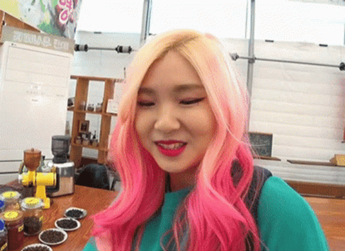 Pink Haired Girl Using Magnifying Glass GIF