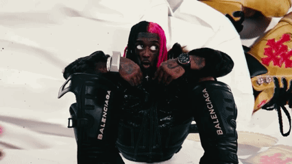 Pink-Haired Man in Black Jacket with Balenciaga Sleeves