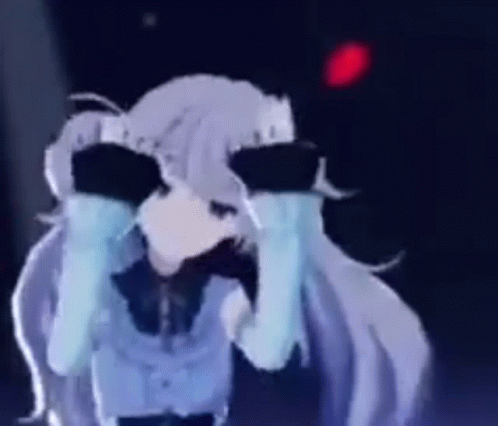 Pink Monster With Purple Eyes And Symbol On Face GIF