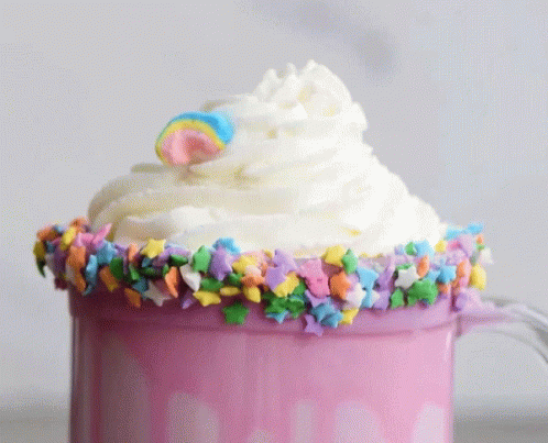 Pink Mug With Whipped Cream and Sprinkles