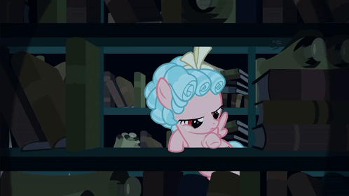 Pink Pony With Blue Hair Sitting on Shelf