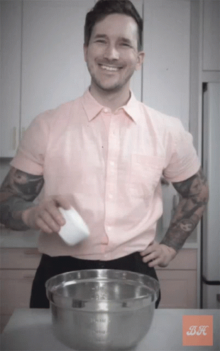 Pink Shirt Man With Metal Bowl BK GIF